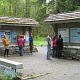 The group checking out the bulentin board outside the ranger station.